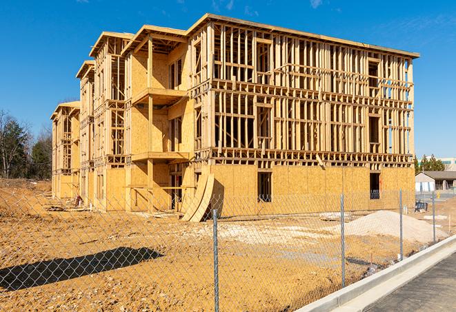 construction site fencing offers protection and privacy in Roxbury